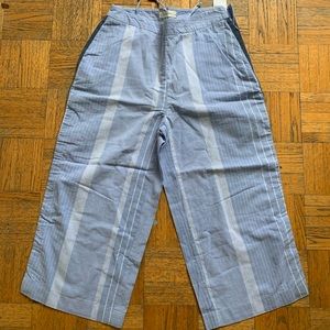 Blue pants with thin white stripes